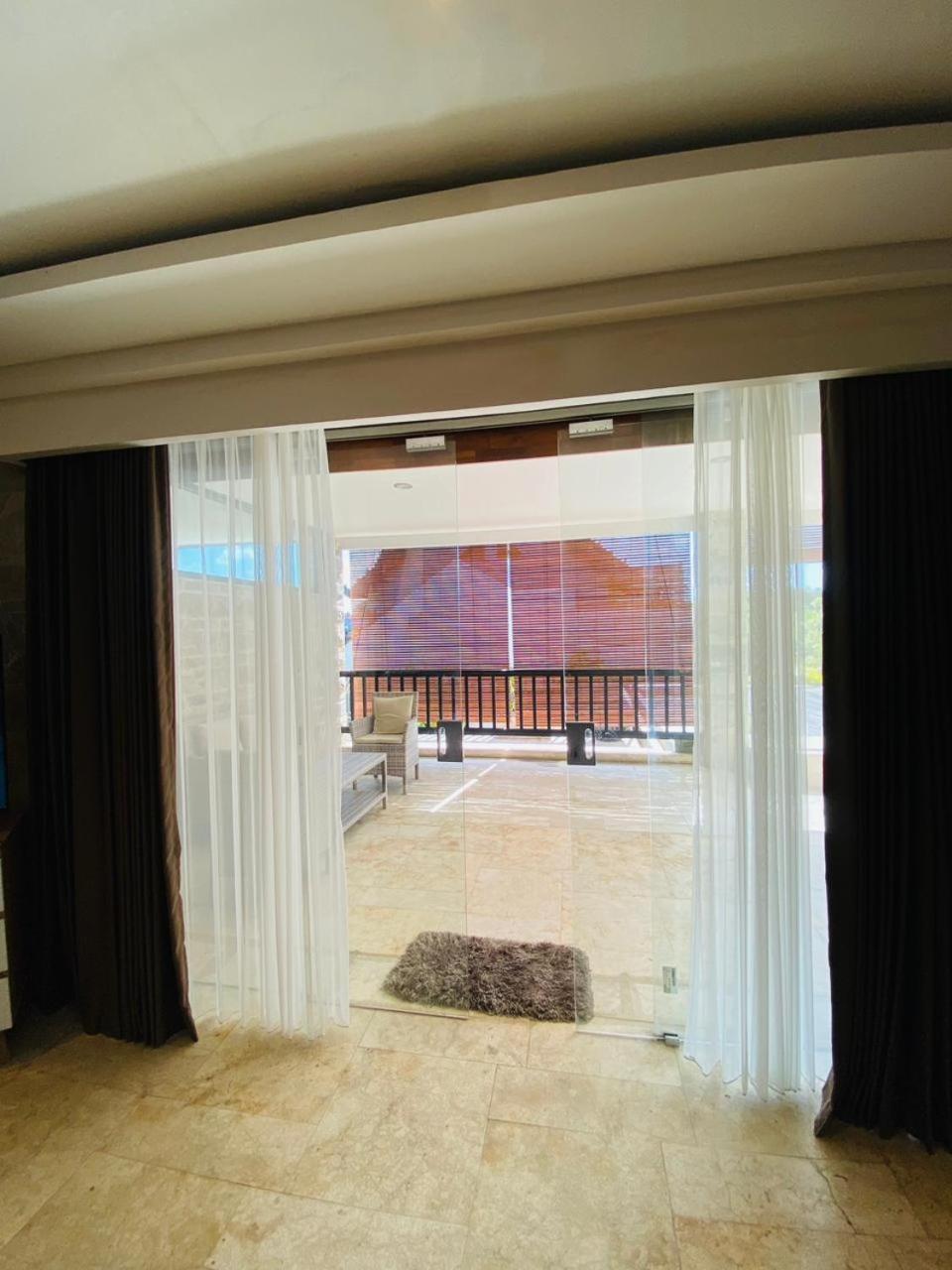 Puri Ratu Jimbaran Hotel Exterior photo